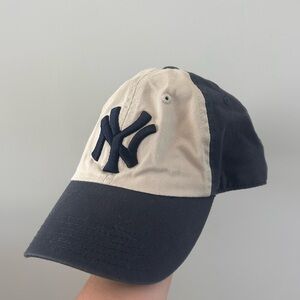 Genuine Merchandise Navy and Cream Baseball Cap with Embroidered Logo